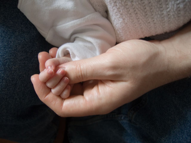 Jessica's and Garry's hand (no prizes for guessing which is which)